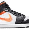 Air Jordan 1 Mid Gets Swathed in Geometric Prints DC7294-600